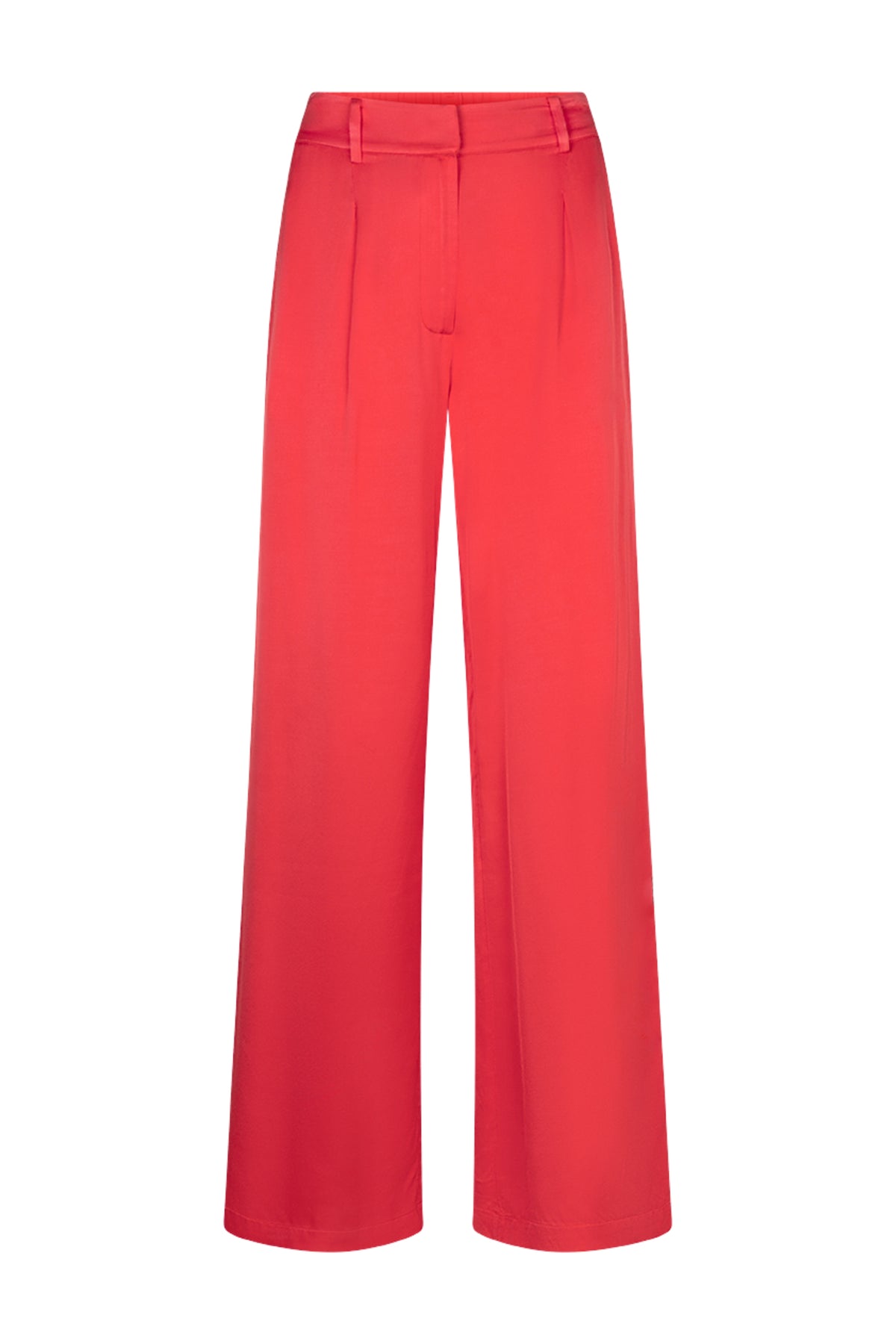 Ibana Pasha Rosa Coral broek met brede pasvorm en elastische taille, gedragen door een model in een lichte, stijlvolle setting.