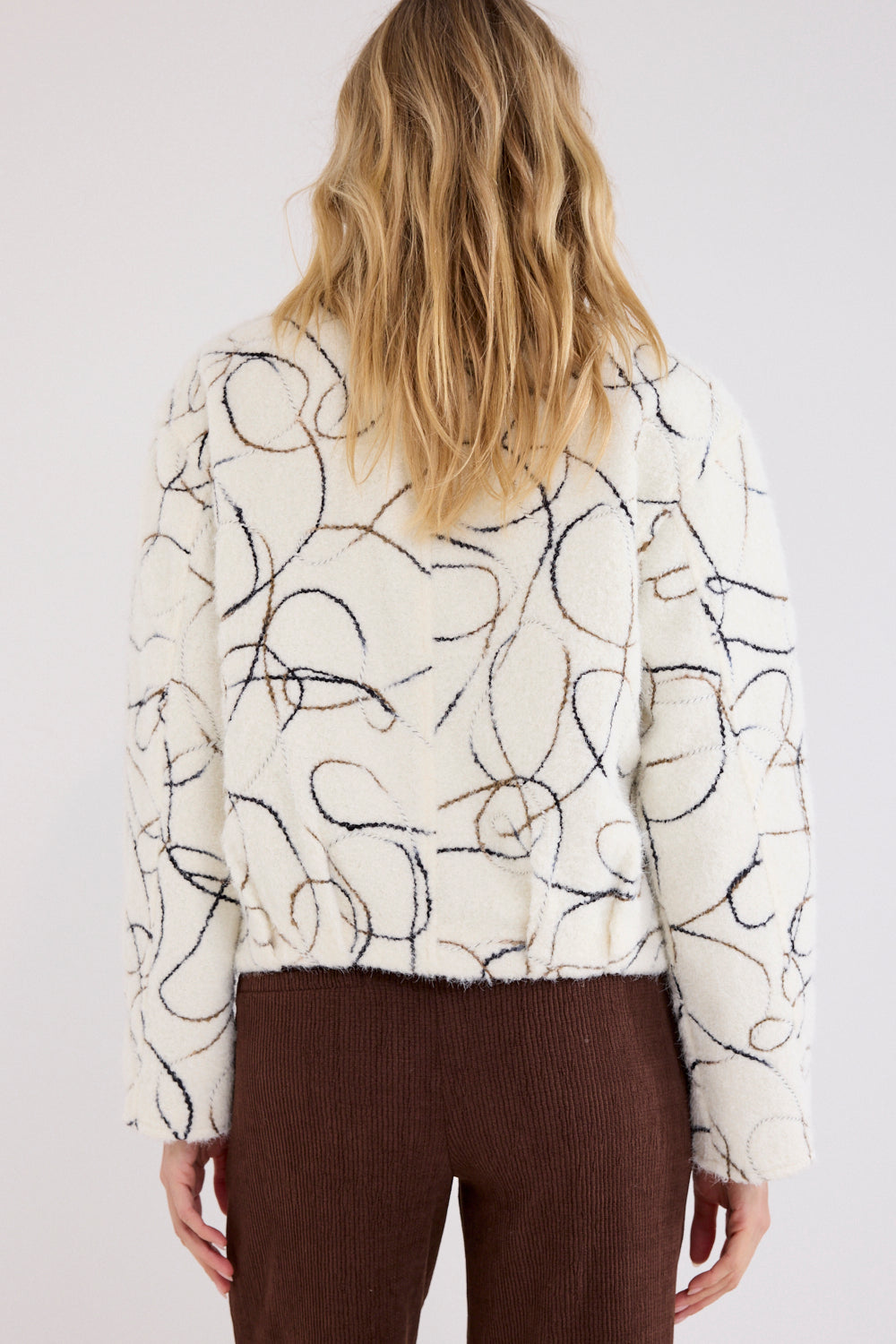 Tramontana graphic teddy snow jas voor dames, warme winterjas met opvallende print en capuchon, geschikt voor koude dagen.