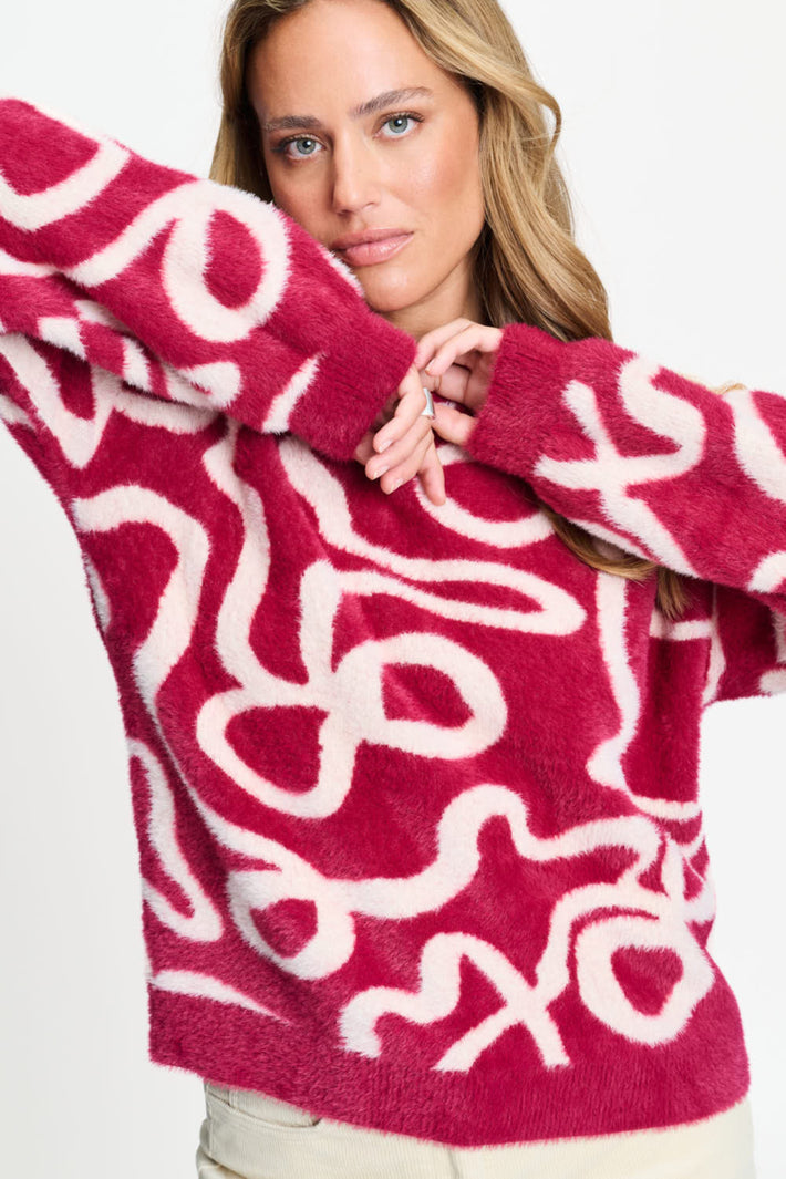 POM Amsterdam Frida Bow trui in burgundy rood met gebreide textuur en strikdetail, vol comfort en stijl.