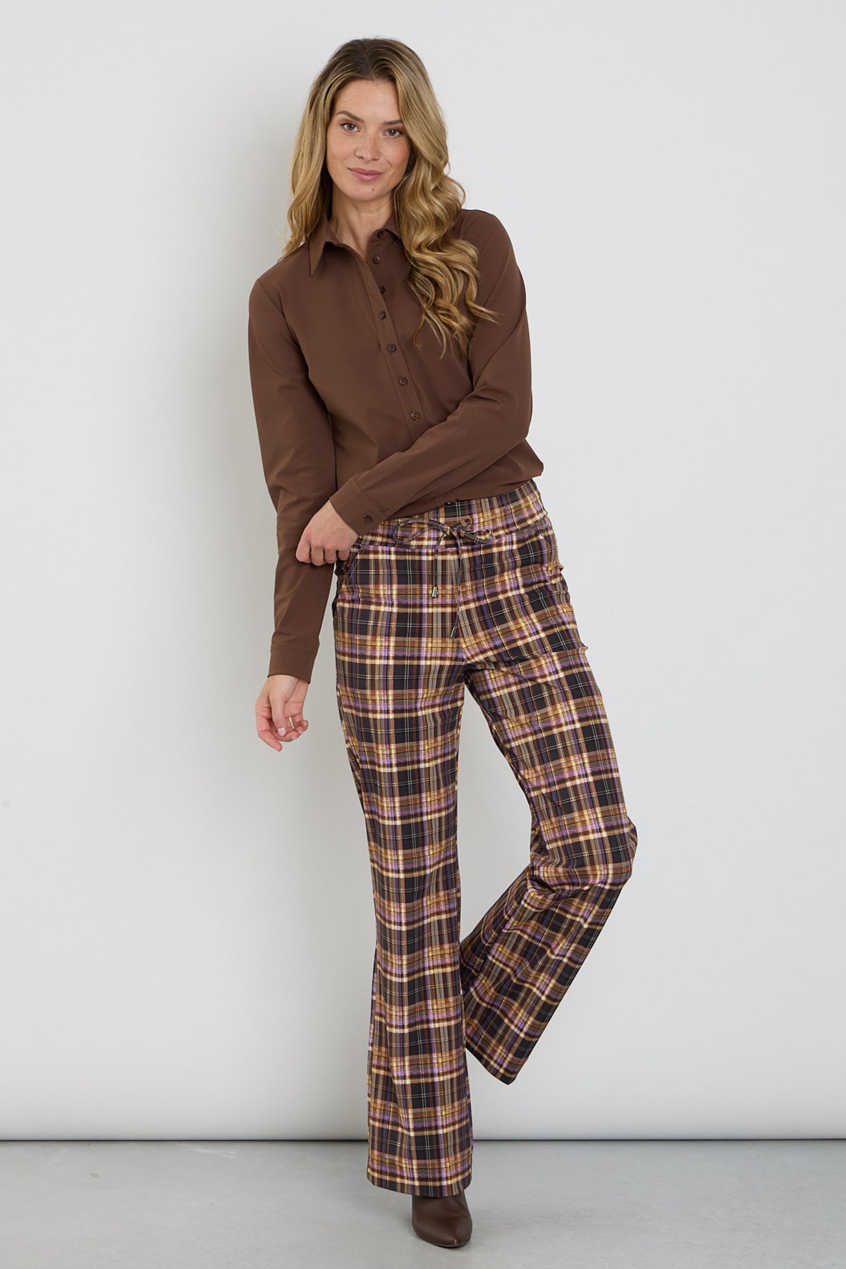 Dameswinterbroek Mi Piace Heavy Travel Check in paars, met gewatteerde stijl en comfortabele pasvorm.