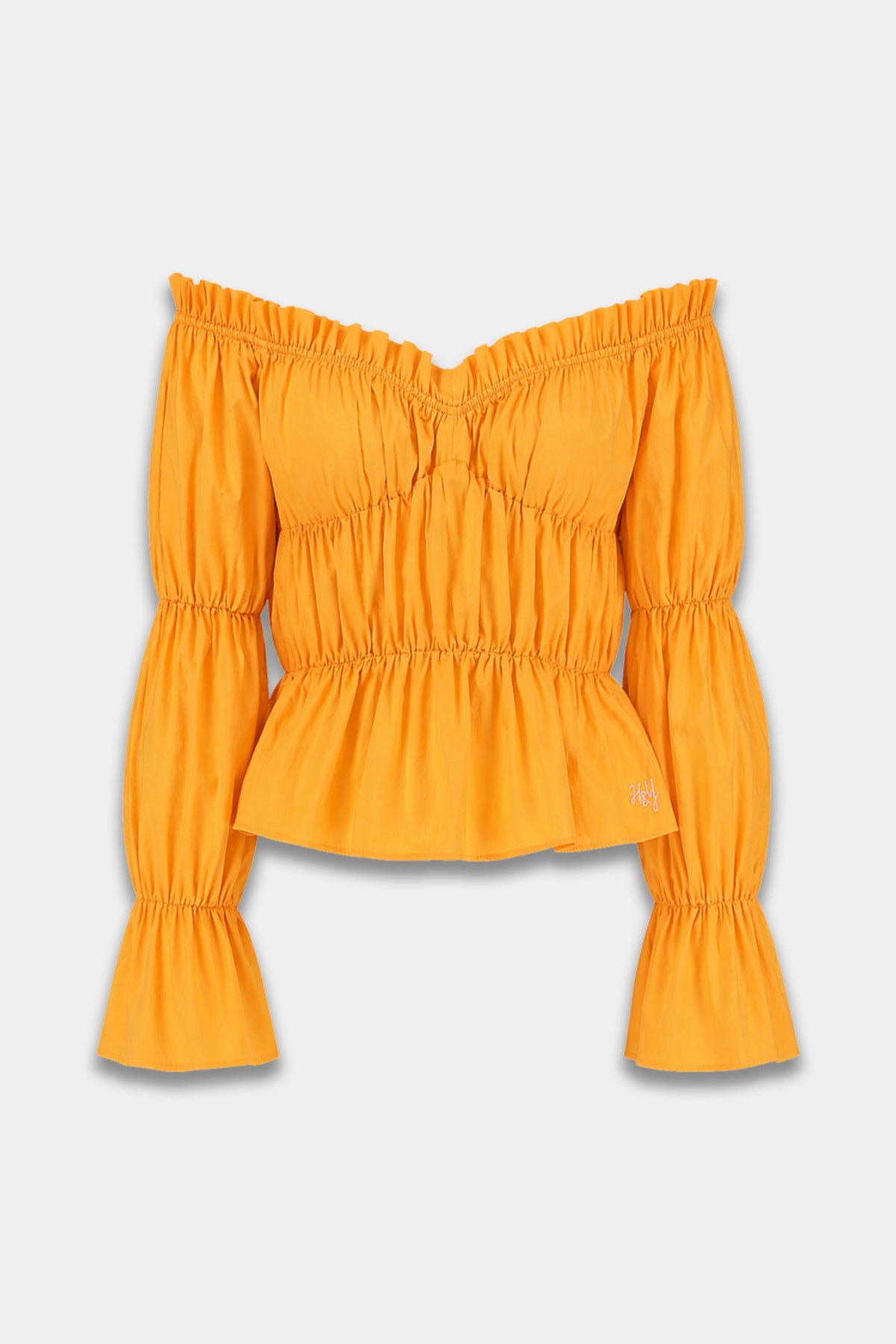 Harper & Yve Top Roan Blazing Orange HS6P601, close-up van de oranje top met details en textuur, gedragen door een model.
