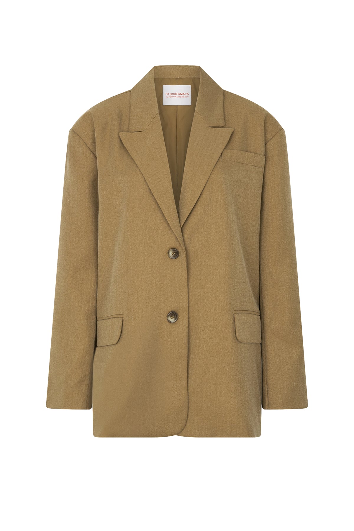 Groene blazer van Studio Amaya, model Campello, getoond op een model met knoopsluiting en reverskraag.