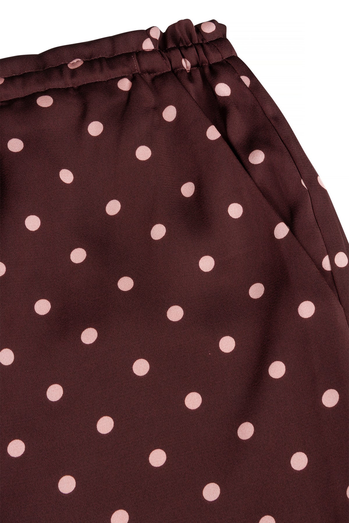 Lichte Bordeaux Avenna broek van Studio Amaya, getoond in een stijlvolle pasvorm en gladde stof, perfect voor casual en chique gelegenheden.