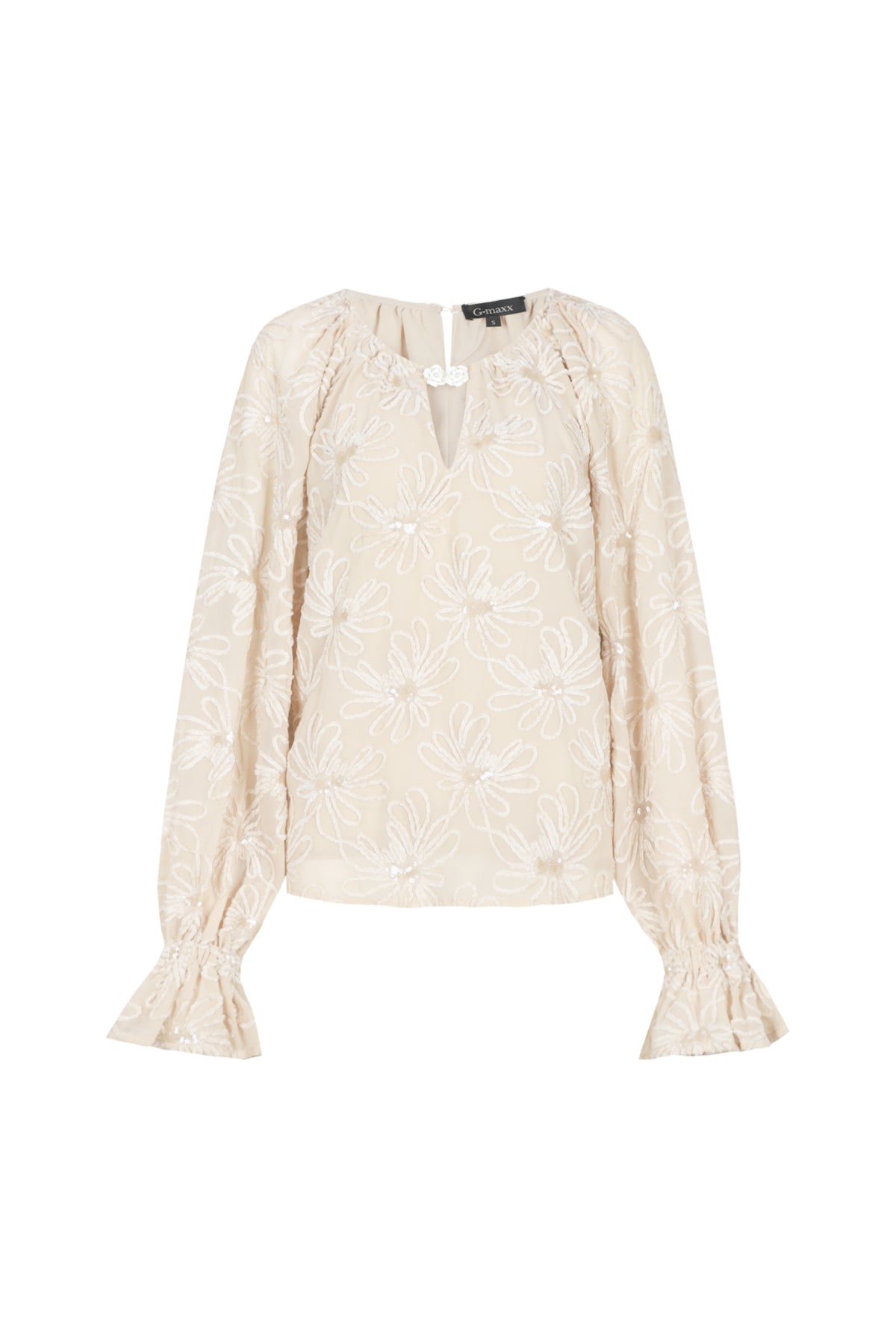 G-maxx Frida Sand blouse met lange mouwen, losvallend ontwerp en zachte sandkleurige stof, gedragen door een model.