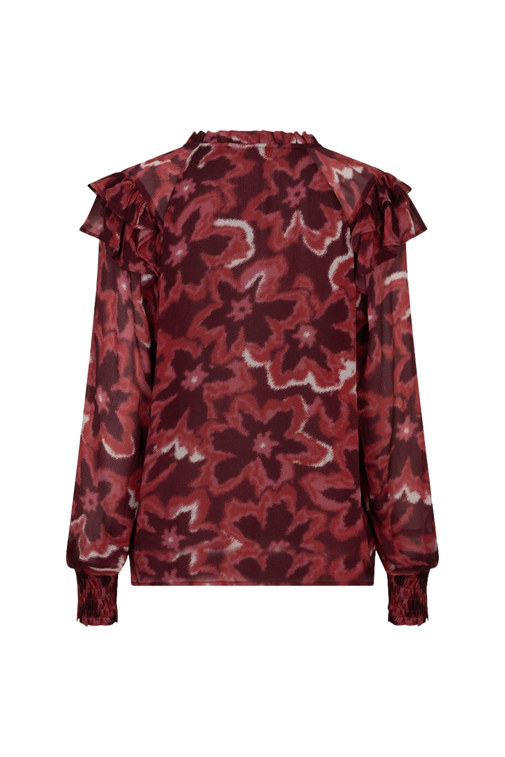 Blouse van EsQualo met ruffles en herfstbloemprint, te zien op een model, in warme herfstkleuren.