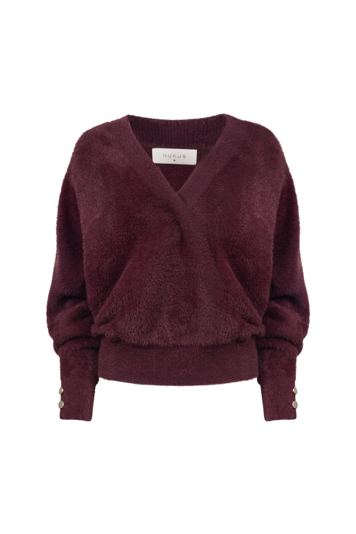 Nukus Beau Wrap Cherry trui in roze met lange mouwen en ronde hals, gedragen door een model.