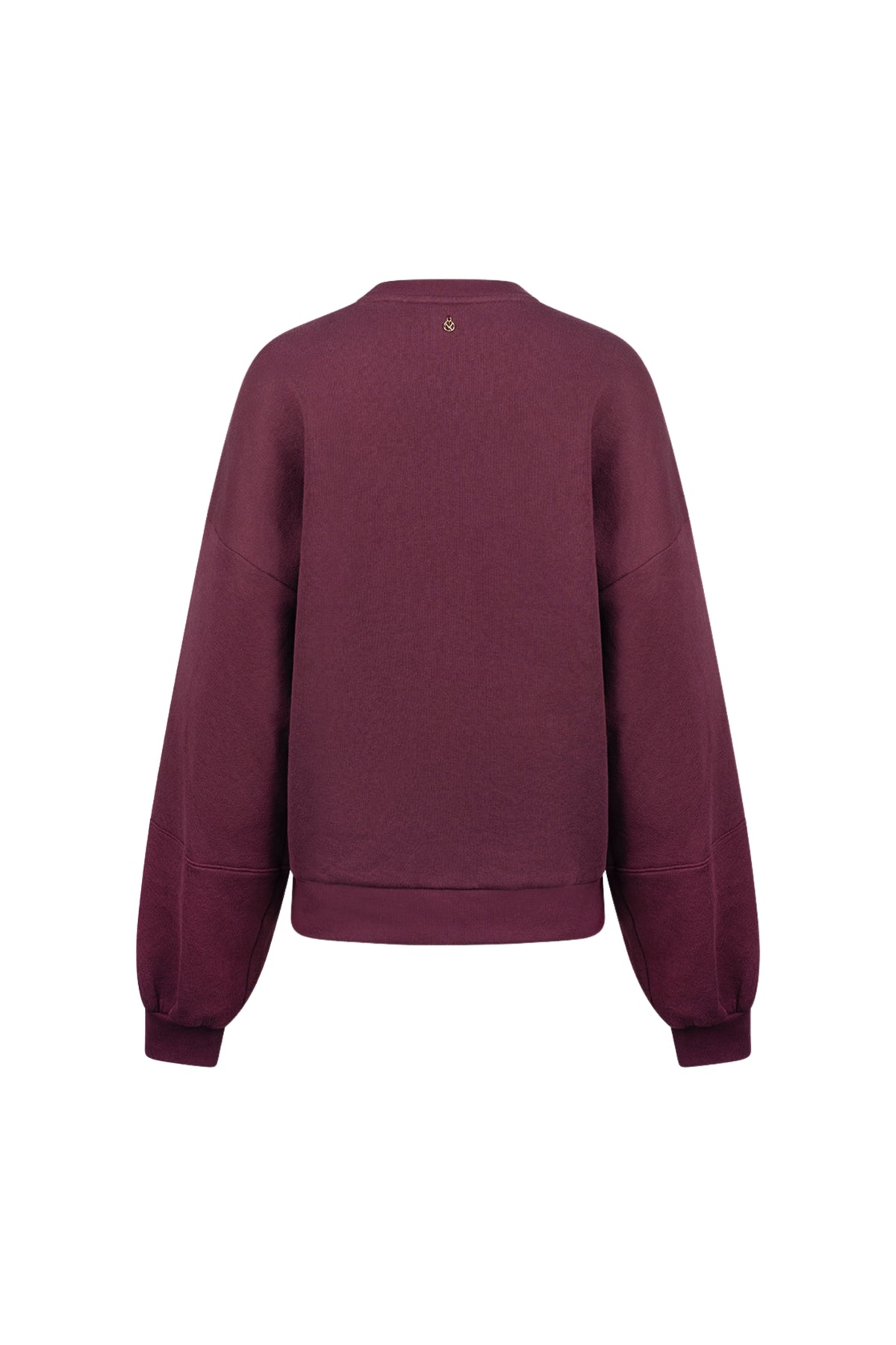 Nukus Nicola Cherry trui in rood met zachte knitstof, close-up van de textuur en ronde hals.