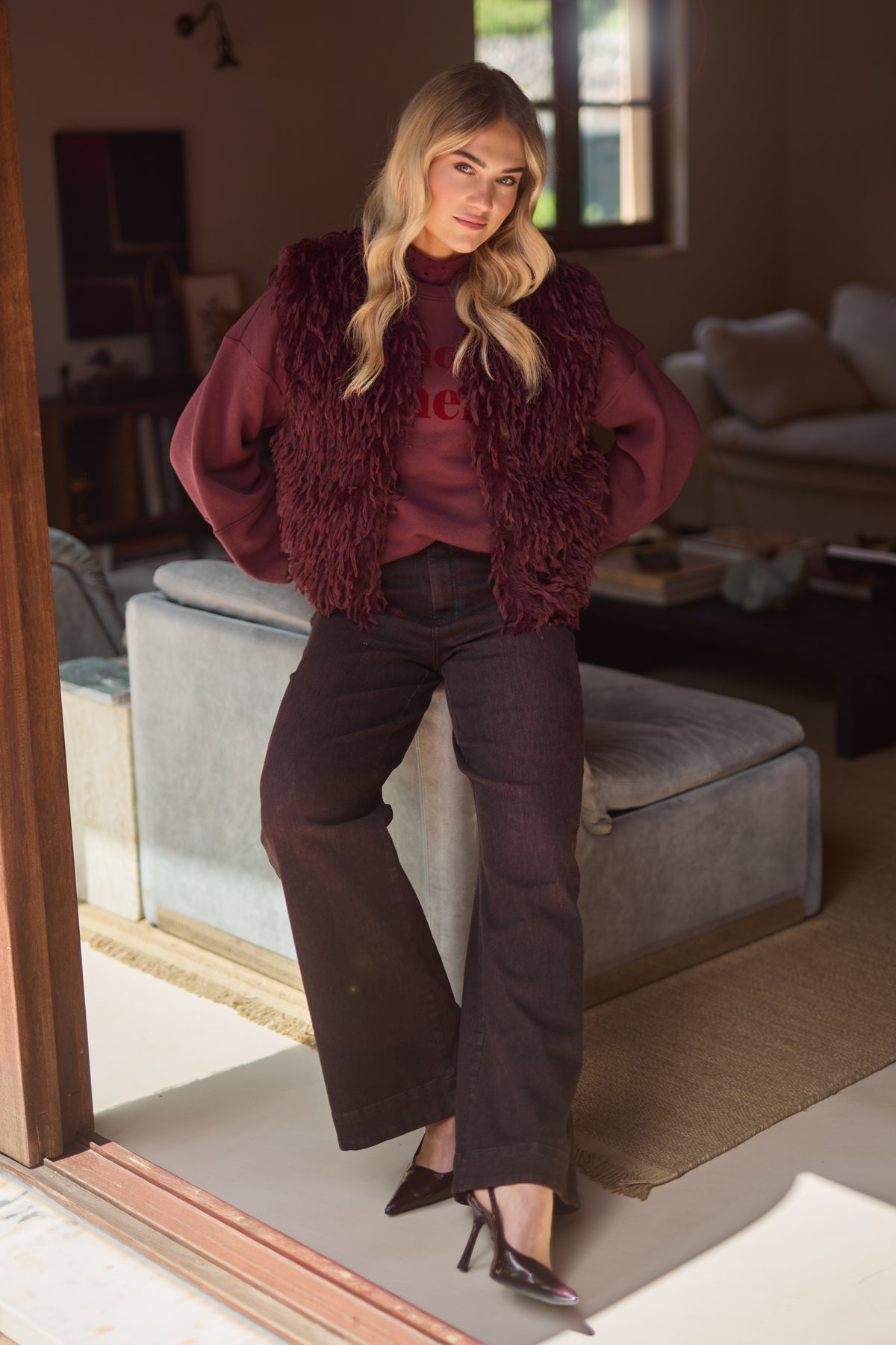 Nukus Nicola Cherry trui in warm amber kleur met zachte stof, geschikt voor casual draagstijl.