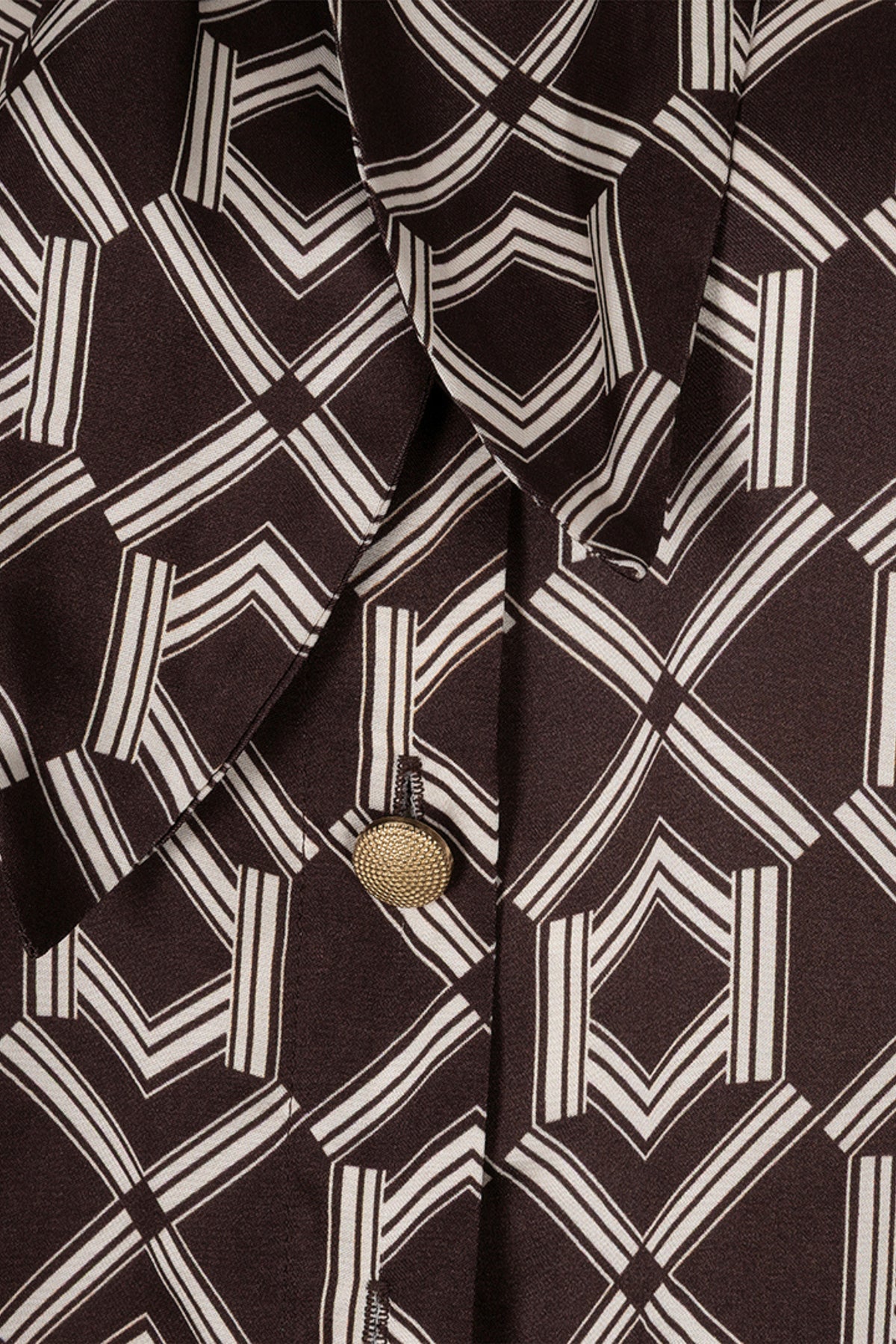 Korte blouse van EsQualo met warme cacao print en strikdetail, geschikt voor casual en stijlvolle outfits.