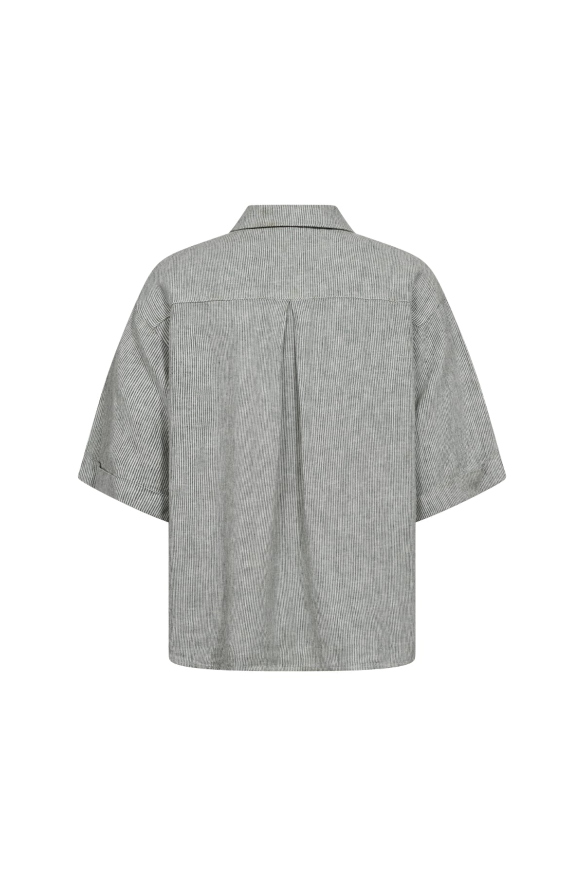 Donkere bosgroene blouse Fqlava van Freequent met witte sterren en offwhite details, getoond op een model.