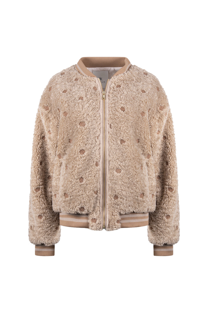 Nukus Henny Dots Sand jas met zwart-witte stippen, comfortabele pasvorm en stijlvolle uitstraling voor dames.