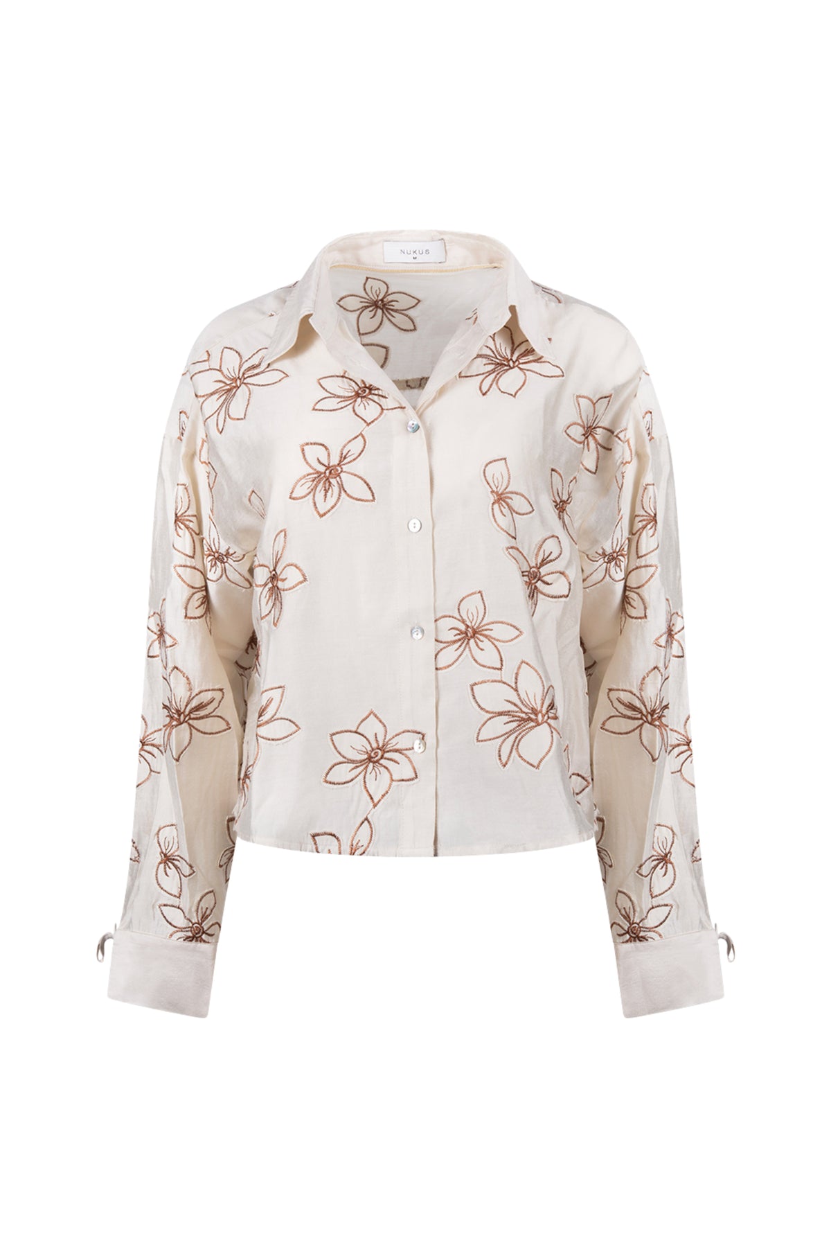 Blouse Bailey Flower Sand van Nukus met bloemenprint en losse pasvorm, zichtbaar in de afbeelding.