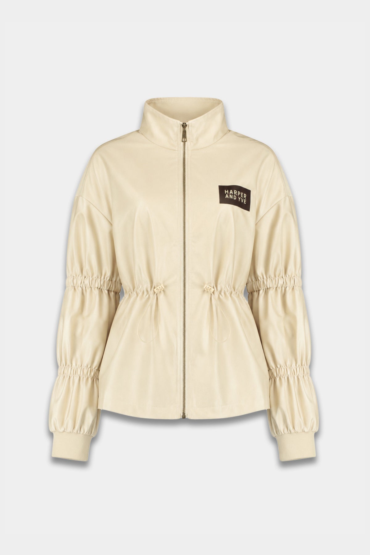 Harper & Yve Gina Almond Oil jas met gebreide details en knoopsluiting, draagbaar voor herfst en winter.