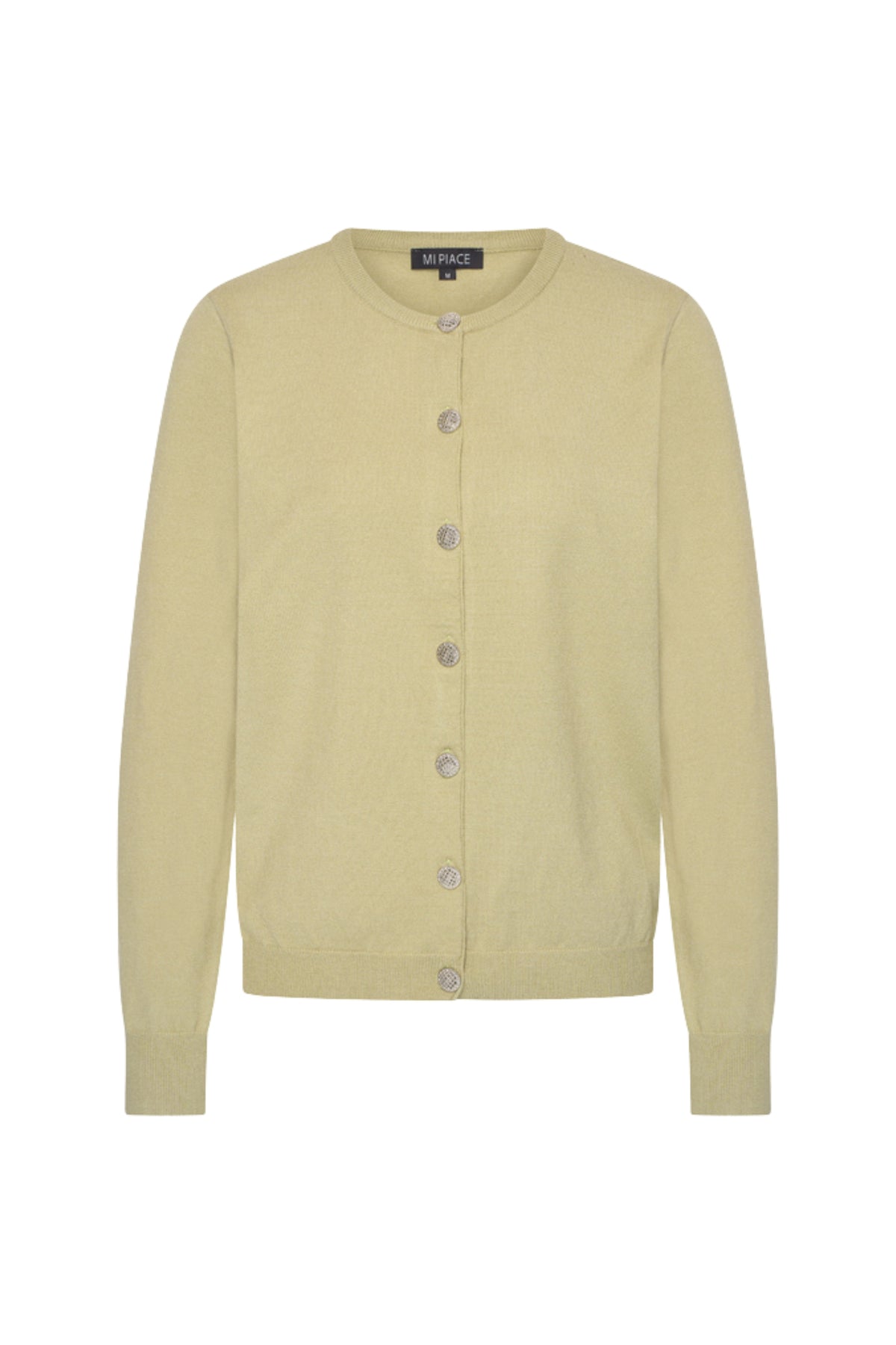 Mi Piace wintervest Pear 202903 in beige met warme uitstraling en knopen, gedragen door een model.