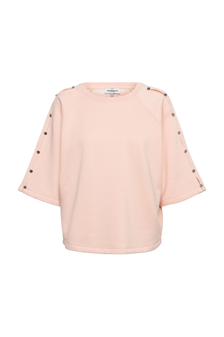 Roze trui Sterre Powder Pink van &Co woman, zachte gebreide structuur, gedragen door een model.