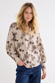 Gestreepte blouse van Tramontana in zwart-witte kleuren met borduursel, zichtbaar op de afbeelding.