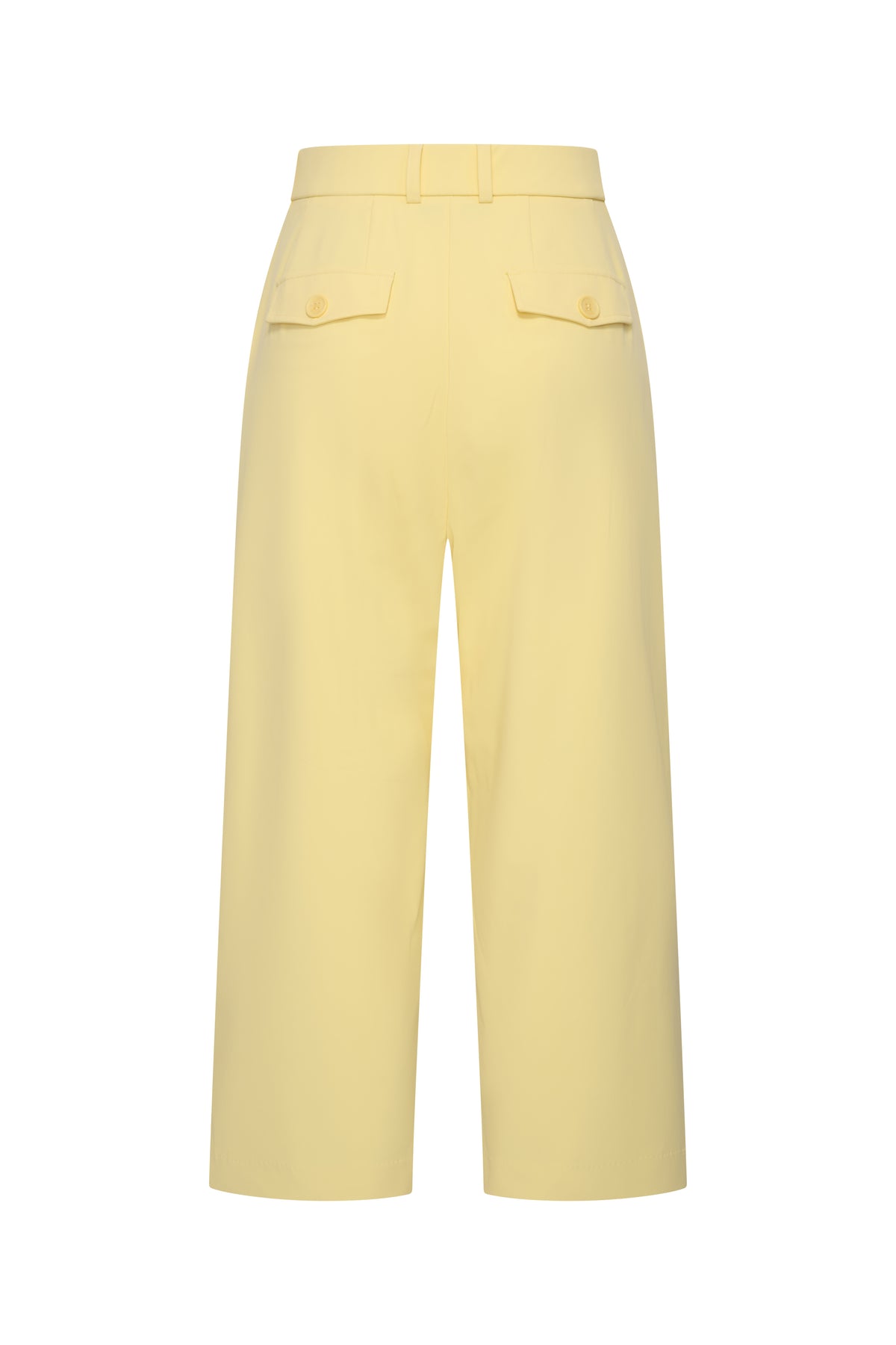 Lichte gele reisculotte met plooien van Mi Piace, op een model gedragen op de achtergrond.