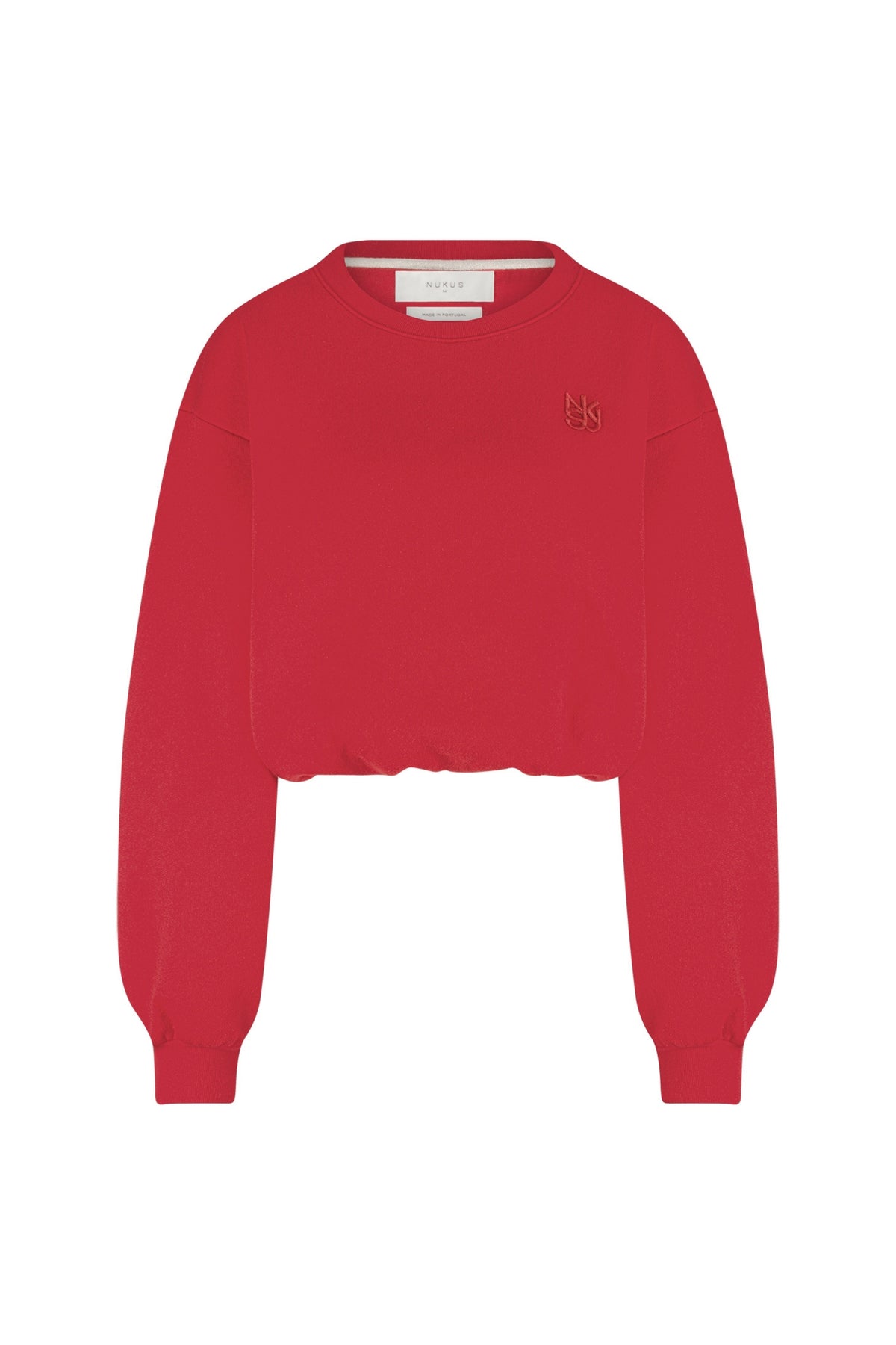 Nukus Amalia Kiss sweater in grijs met ronde hals, zachte stof en casual pasvorm, gedragen door een model.