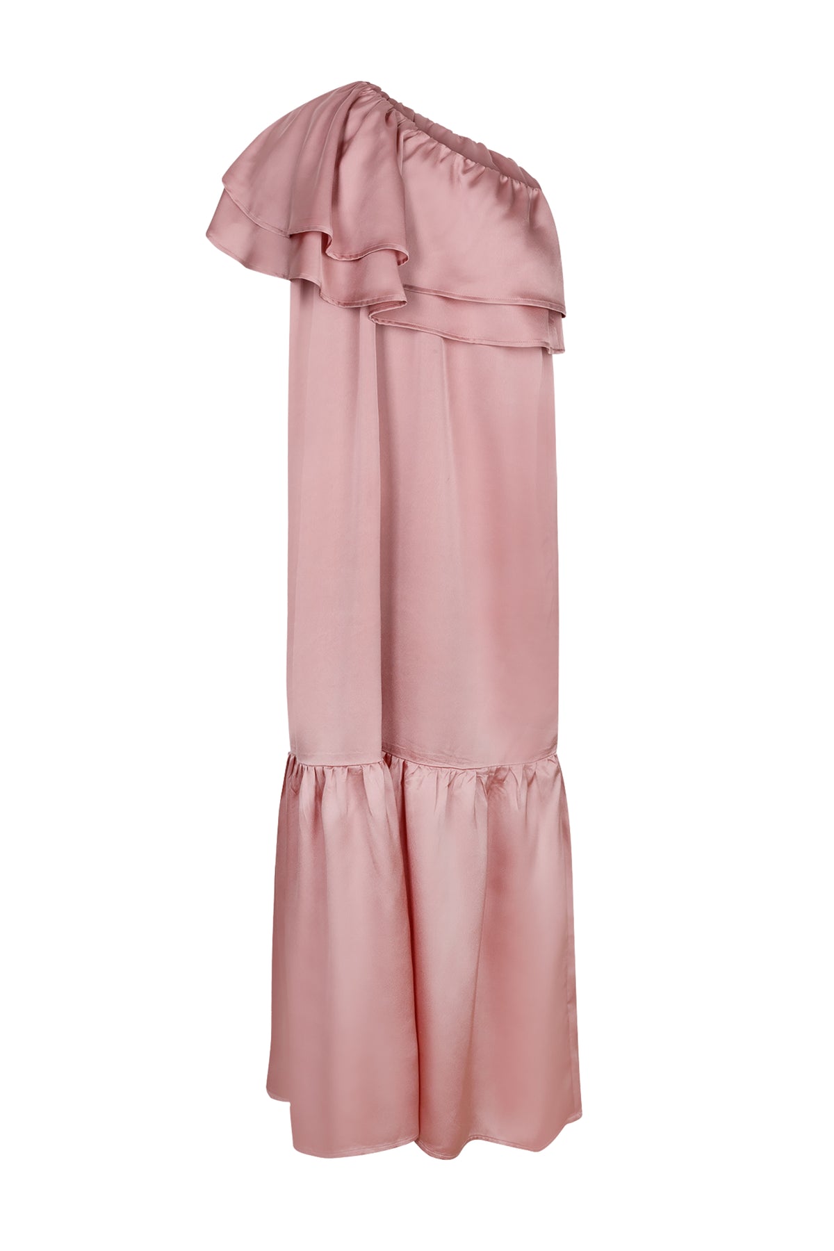 Lichtroze jurk Linne van Studio Amaya met vloeiende stof en elegante snit, gedragen door een model op een neutrale achtergrond.