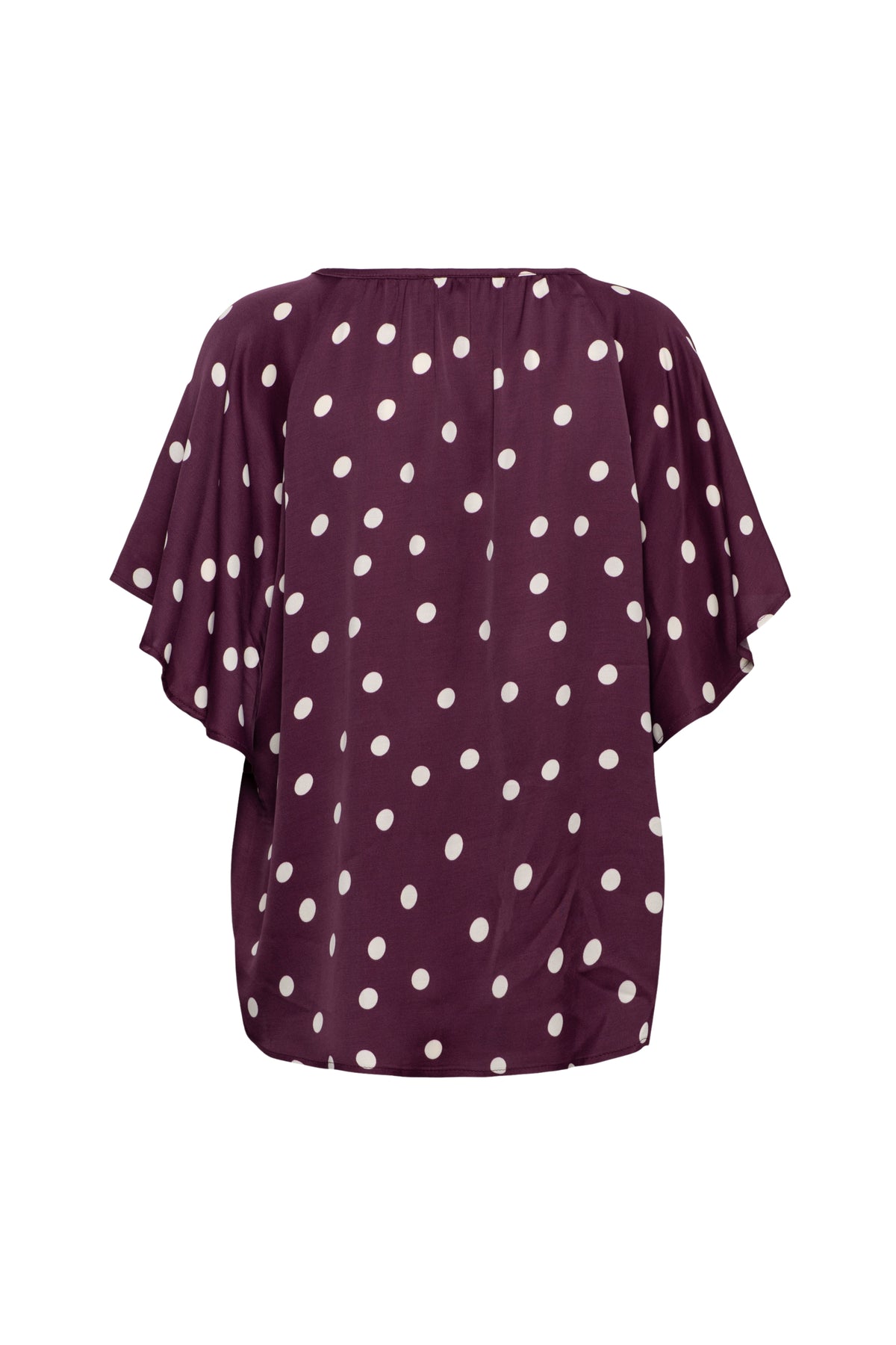 Lichtpaarse &Co woman Axelle Dot Top met kleurrijke stippen en ronde hals, gedragen door een model, close-up shot.