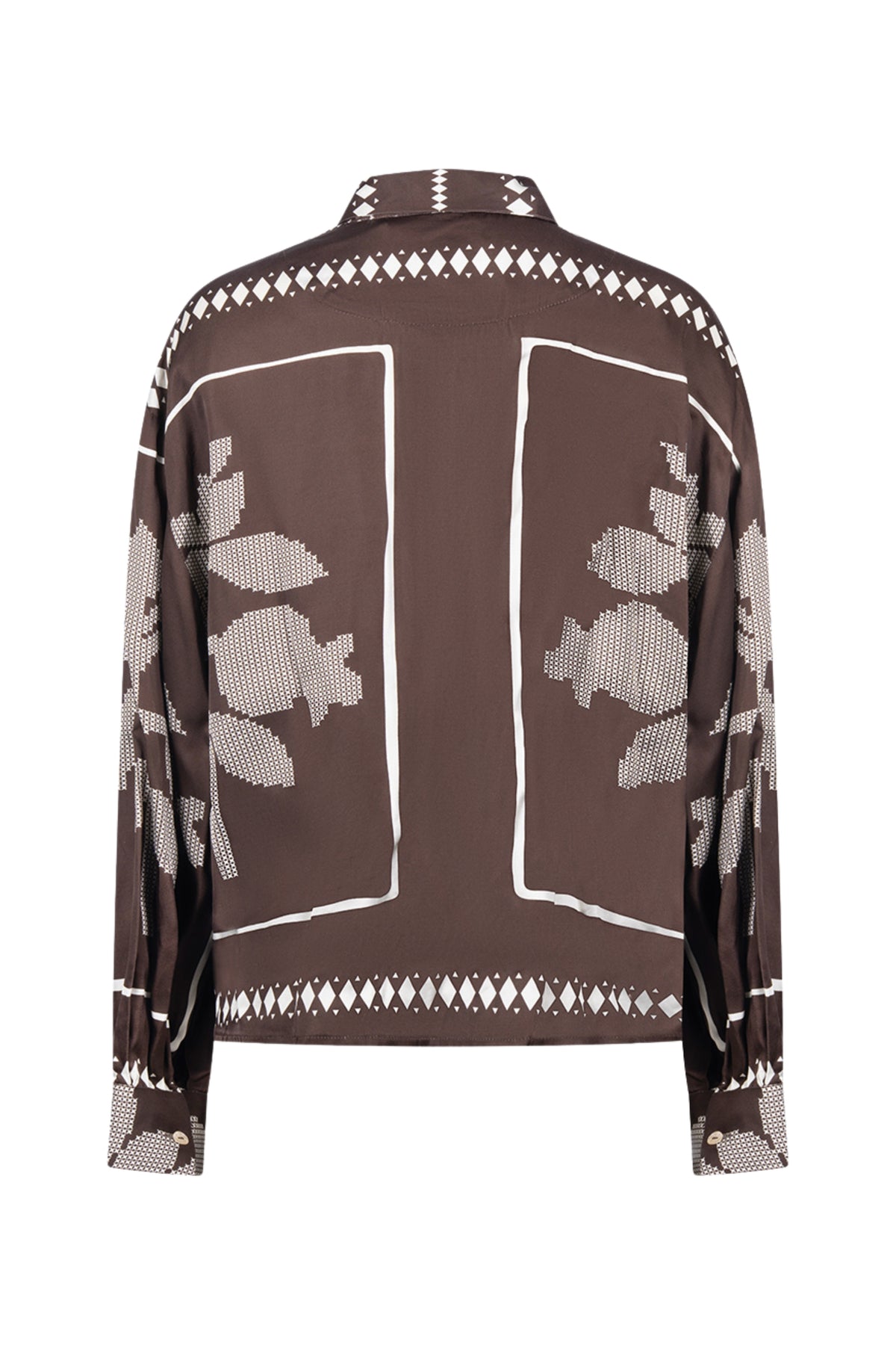 Lichte bruine blouse Alexandra Tie Cross van Nukus met offwhite details en elegante snit, geschikt voor casual en chique gelegenheden.