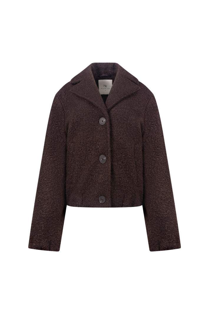 Donkerbruine boucle jas van Nukus Madelin Boucle, stijlvolle heren- of damesjacket met knopen en comfortabele pasvorm.