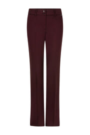 Broek Bibette Punta Burgundy van Red Button, zijaanzicht met ritssluiting en elastische tailleband, casual damesmode.