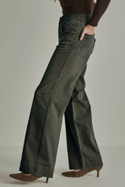 Groene vintage denim broek Mira van Para Mi met rechte pasvorm, L32, zichtbaar met details en textuur op de afbeelding.