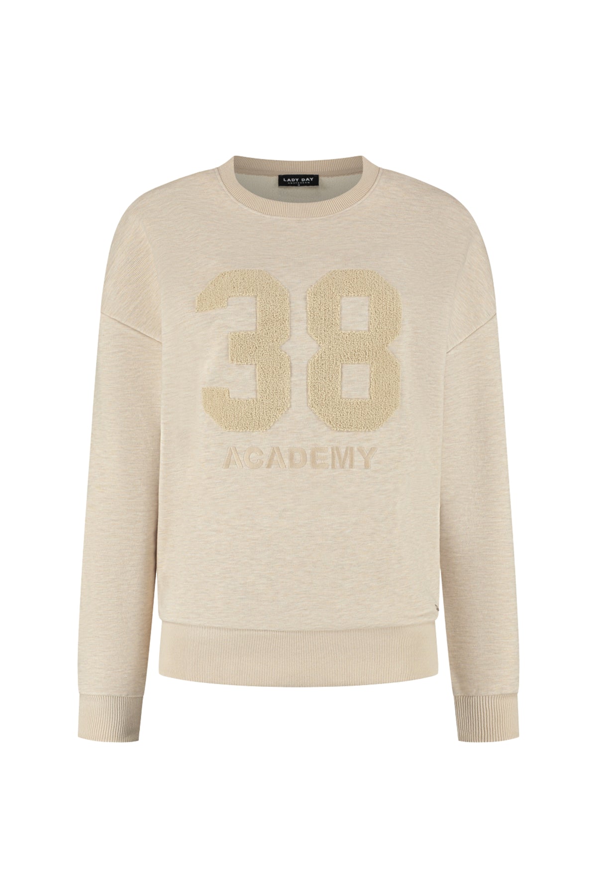 Lady Day trui Academy Vanilla Melange met zachte stof en ronde hals, close-up van de textuur en kleur.
