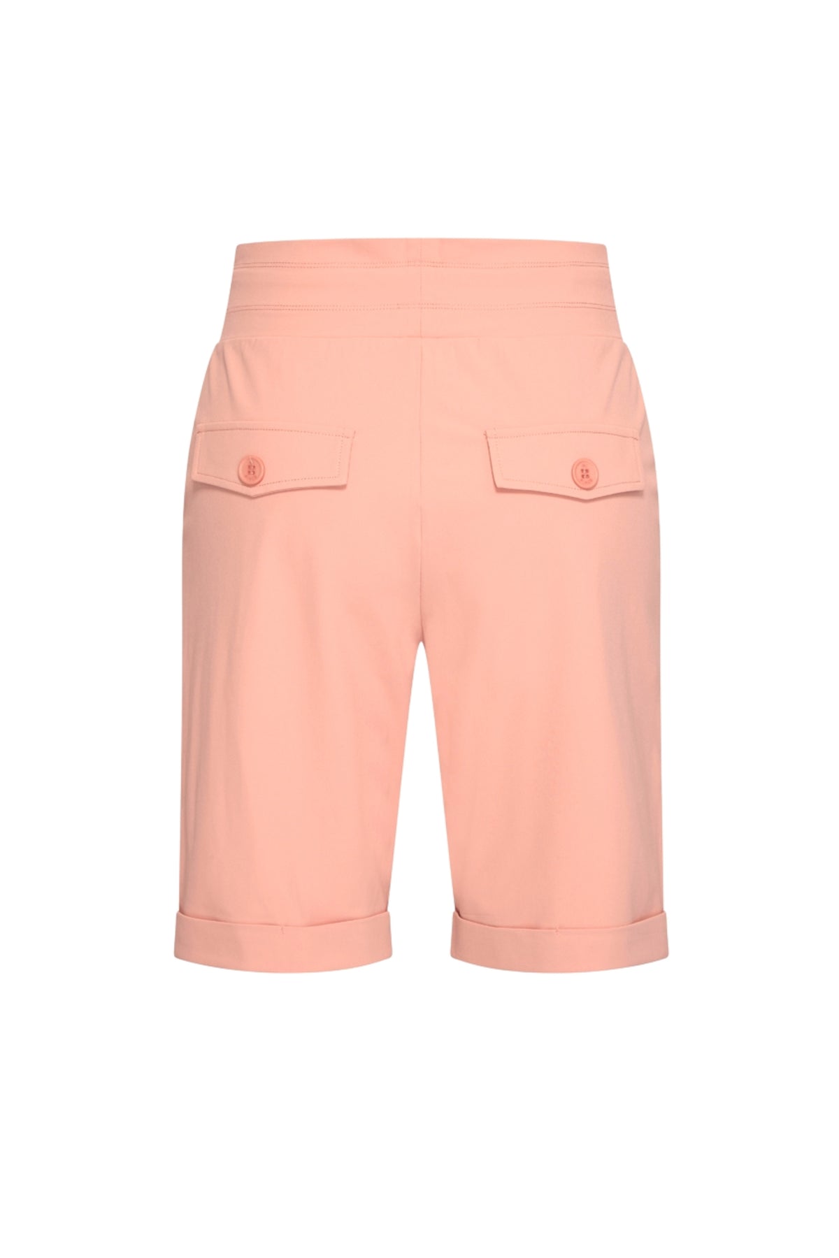 Reisbroek van lichtgewicht peachkleurige stof met amber details, ontworpen door Mi Piace voor comfortabel reizen.