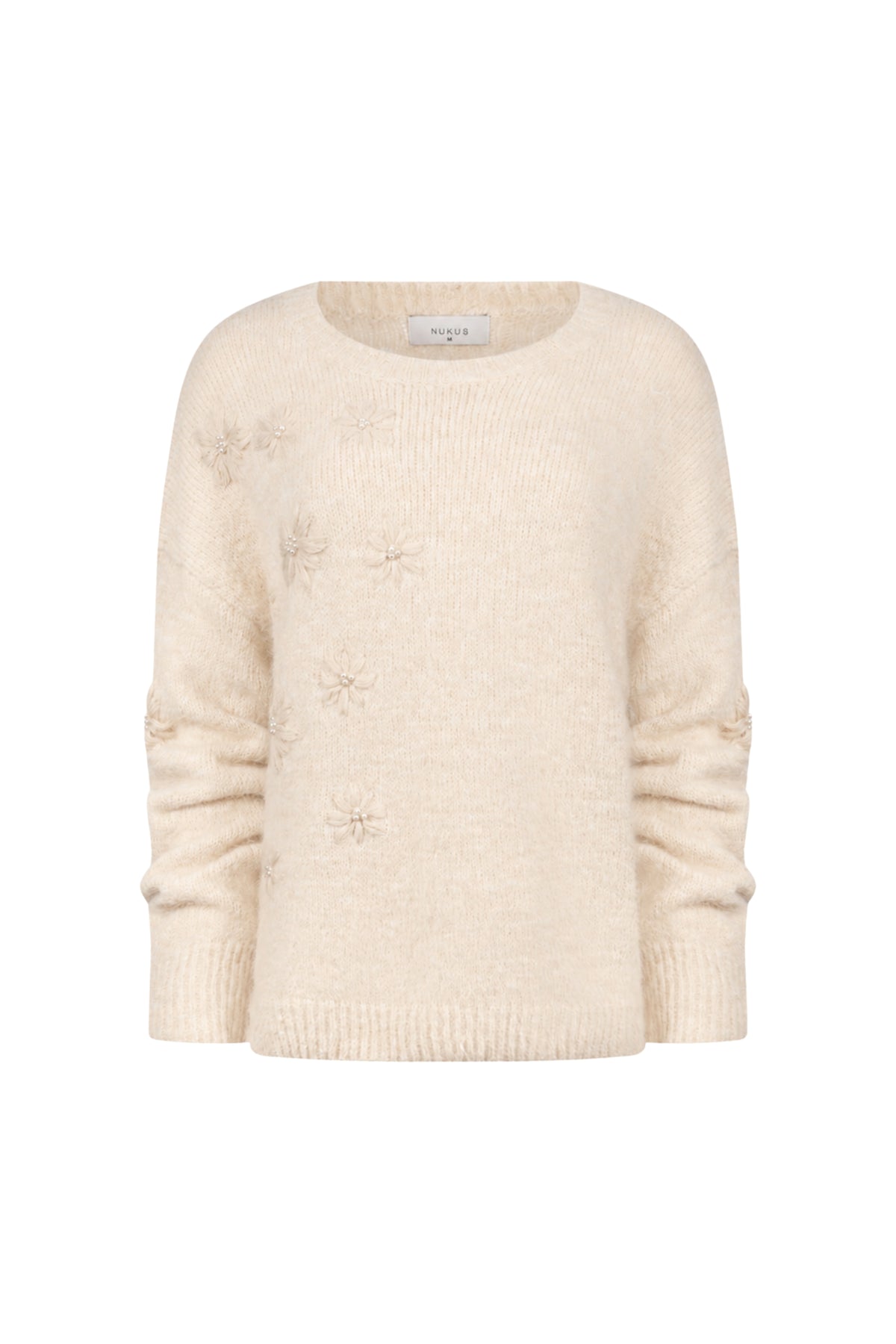 Nukus Trui Konstanza Flower Sand, zachte katoenen trui met bloemprint in zandkleur, comfortabel en modieus voor dagelijks gebruik.