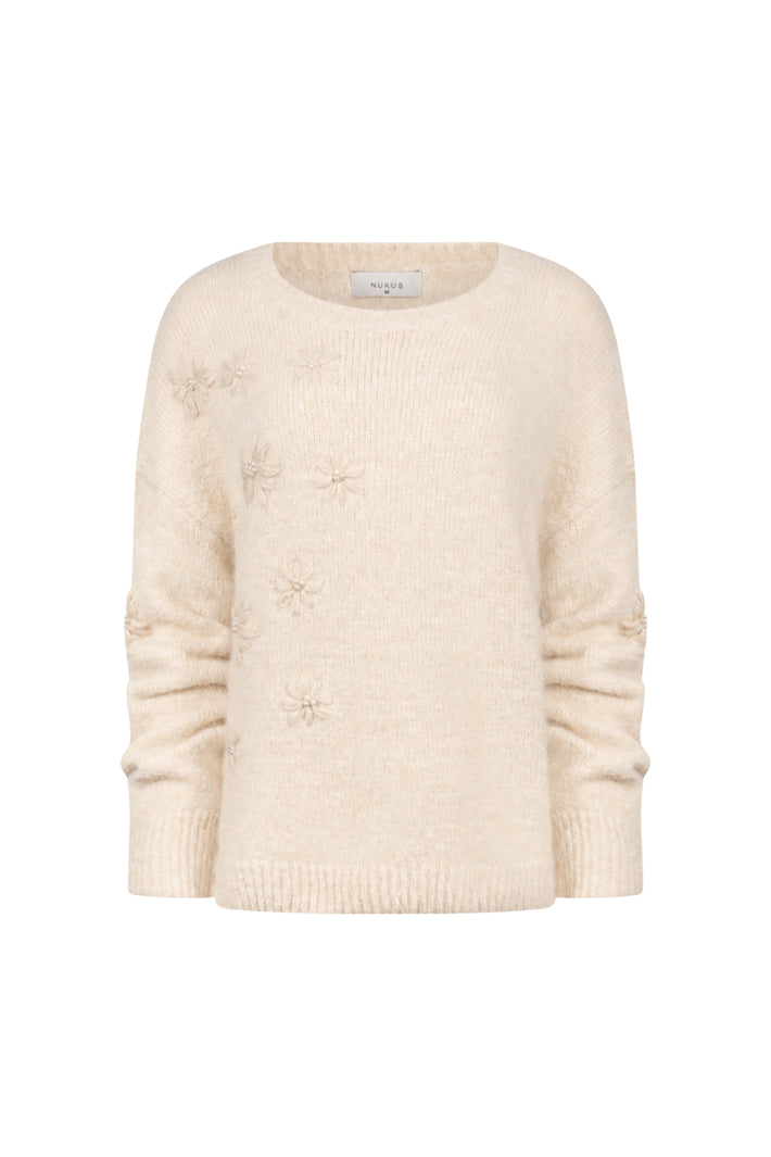 Nukus Trui Konstanza Flower Sand, zachte katoenen trui met bloemprint in zandkleur, comfortabel en modieus voor dagelijks gebruik.