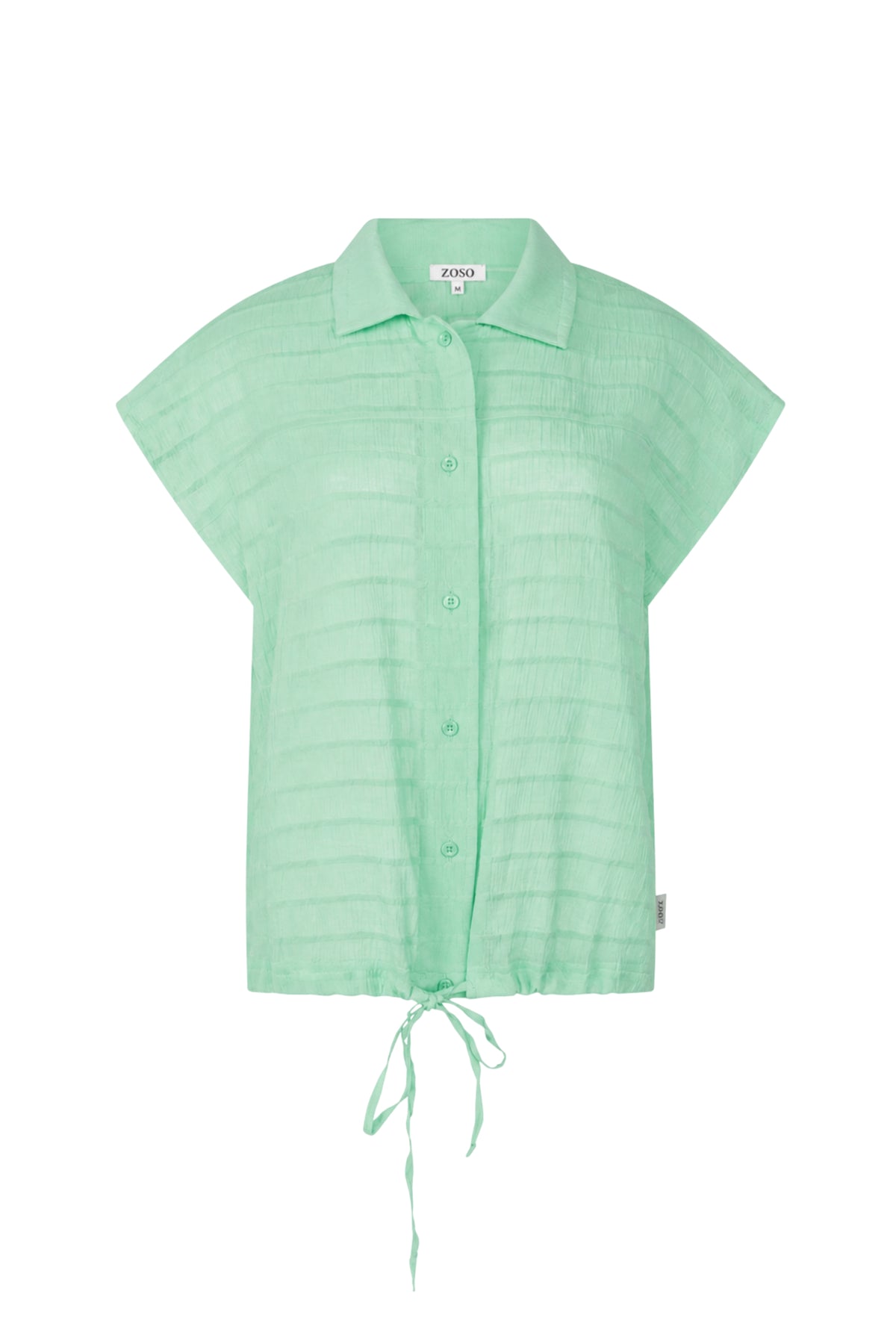 Mintgroene blouse Anna van Zoso, met lange mouwen en knoopsluiting, zichtbaar op de afbeelding.