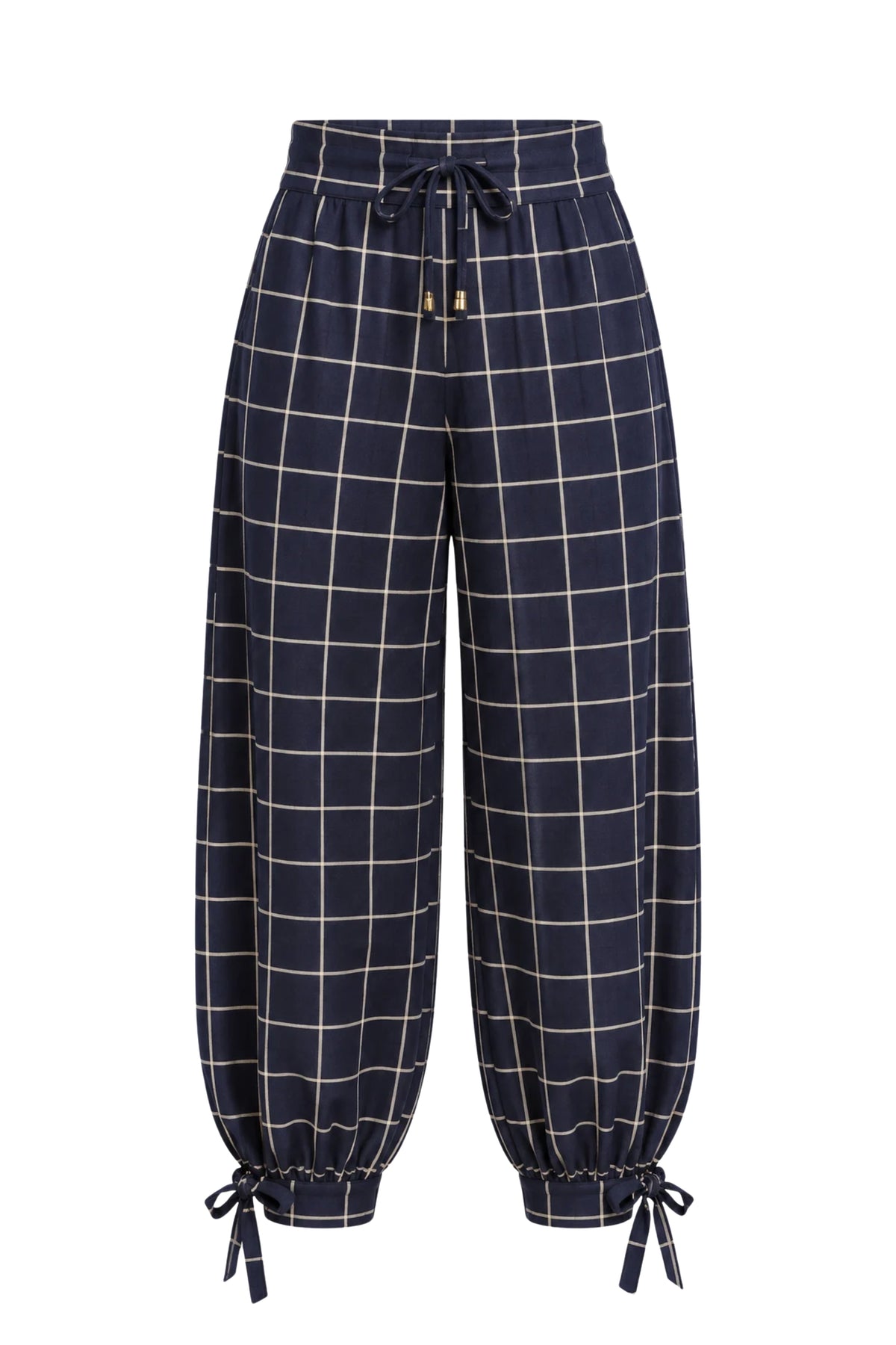 Mi Piace reisbroek met ballonmodel, navy print en strikdetail, geschikt voor comfortabel reizen en casual stijl.