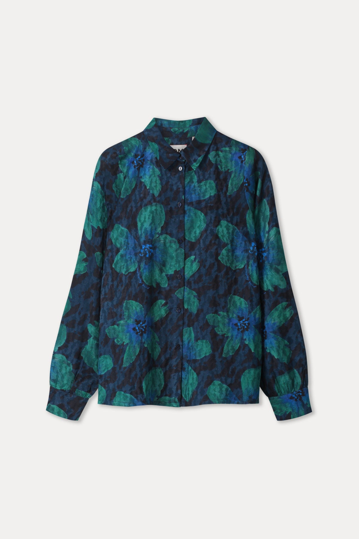 Blouse Mila Bloom in teal groen van POM Amsterdam, close-up van de lichtgewicht, elegante blouse met bloemendetails.