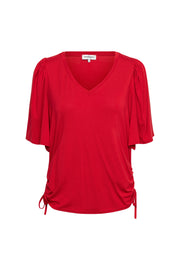 Roze Misha Stone Top van &Co woman, modieus vrouwen top met stenen details, gedragen door een model.