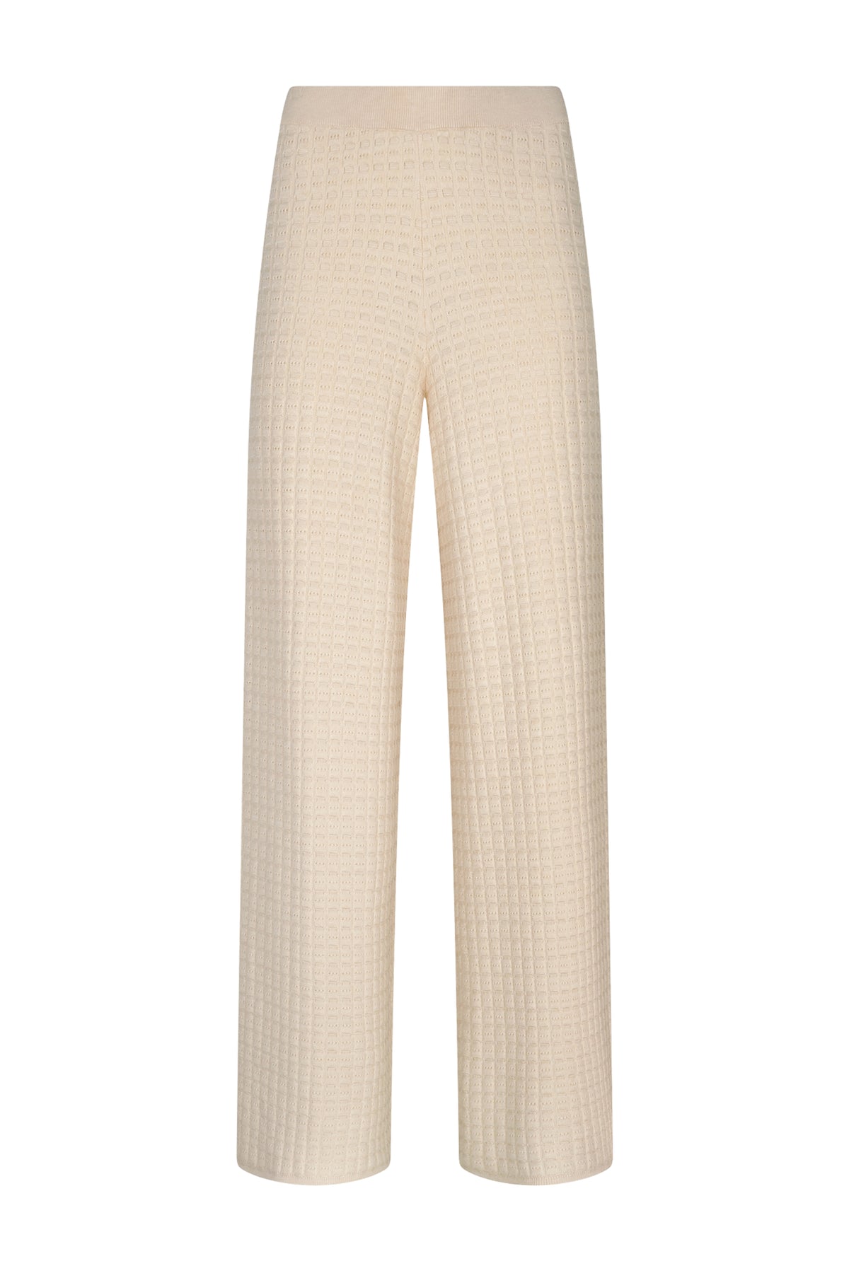 Beige Kensie broek van Studio Amaya, getoond op model, met een casual pasvorm en elastische tailleband.