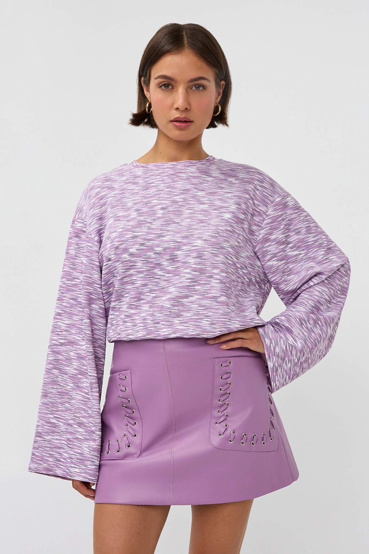 Lila rok Siena van Studio Amaya, wijde pasvorm met elastiek en bloemenprint, geschikt voor casual en zomerse outfits.