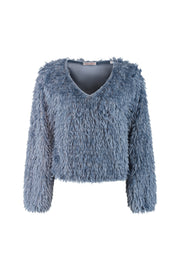 Blauwe top Bridget van Studio Amaya, close-up afbeelding van het stijlvolle damestop met ronde hals en zachte stof.