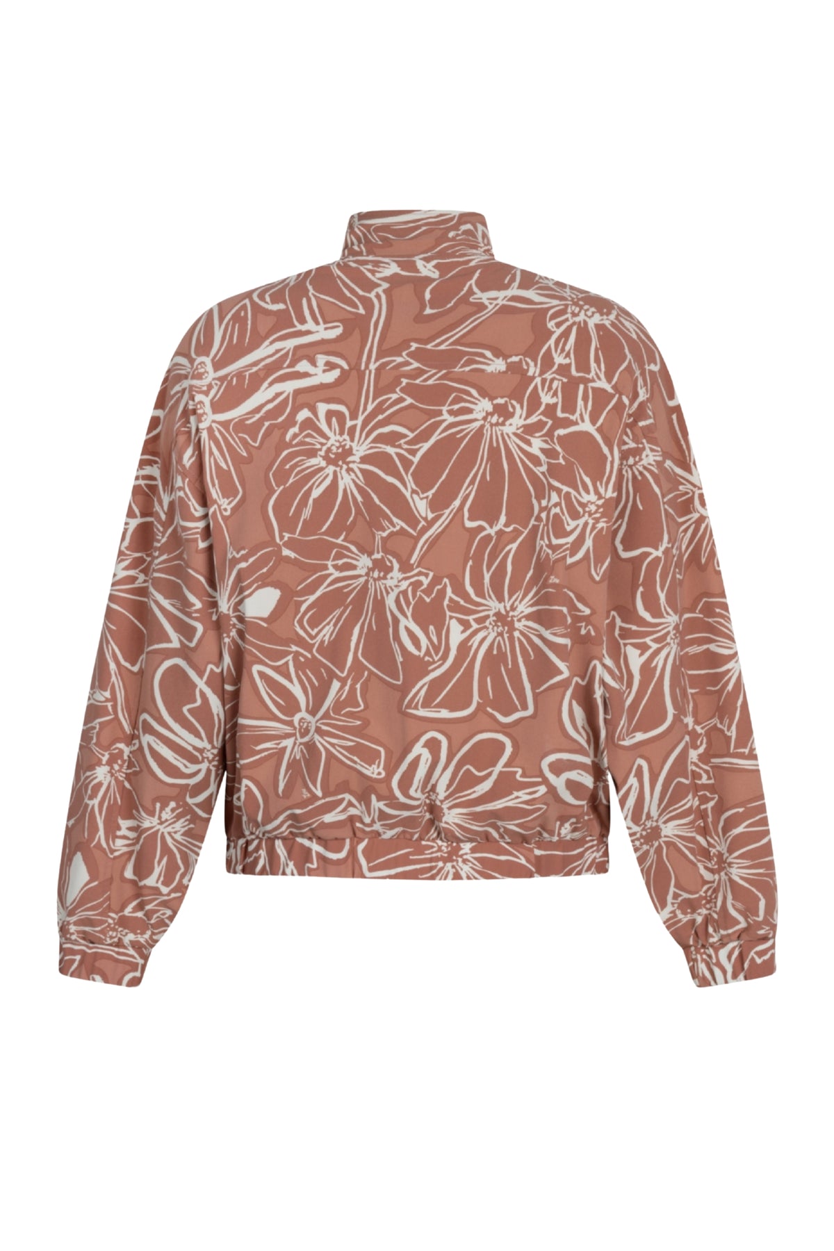 Zoso Travel Jacket Jenny Desert Rose gedragen door een persoon, lichte jas met roze tinten, geschikt voor reizen en buitenactiviteiten